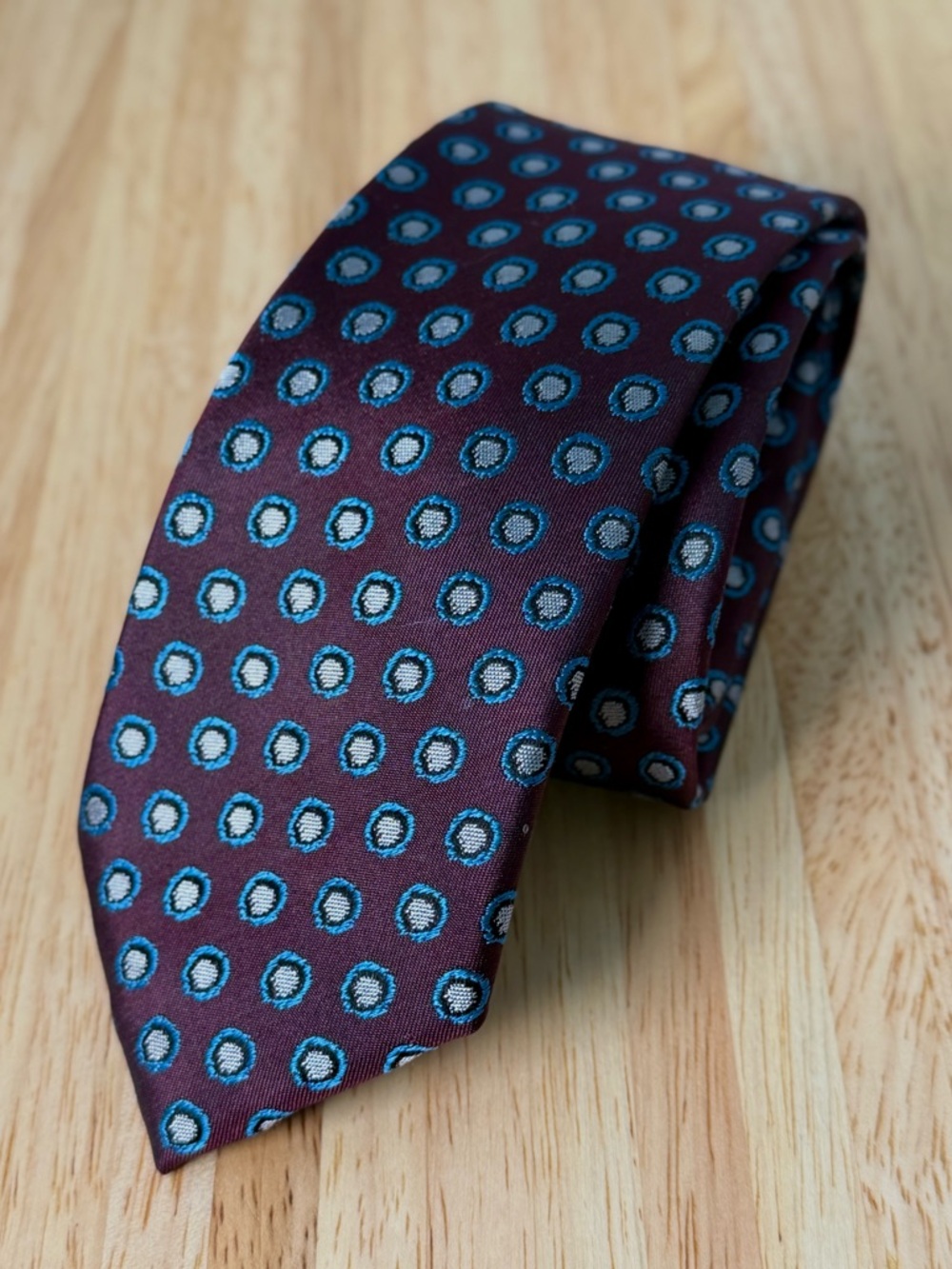Ted Baker Burgundy Tie with Teal Ring Motif